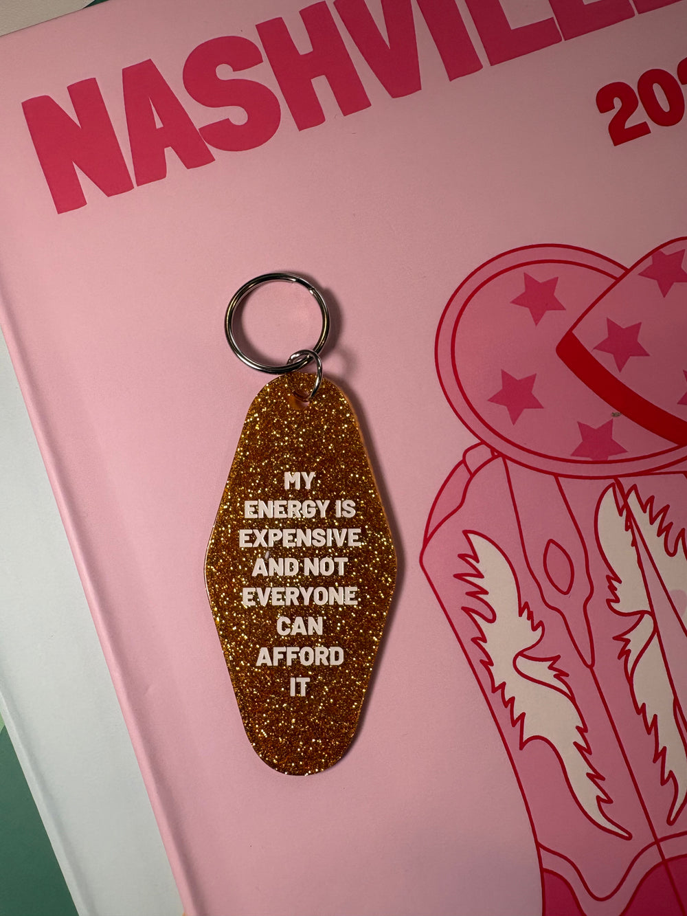 My energy is expensive and not everyone can afford it  - Motel Keychain