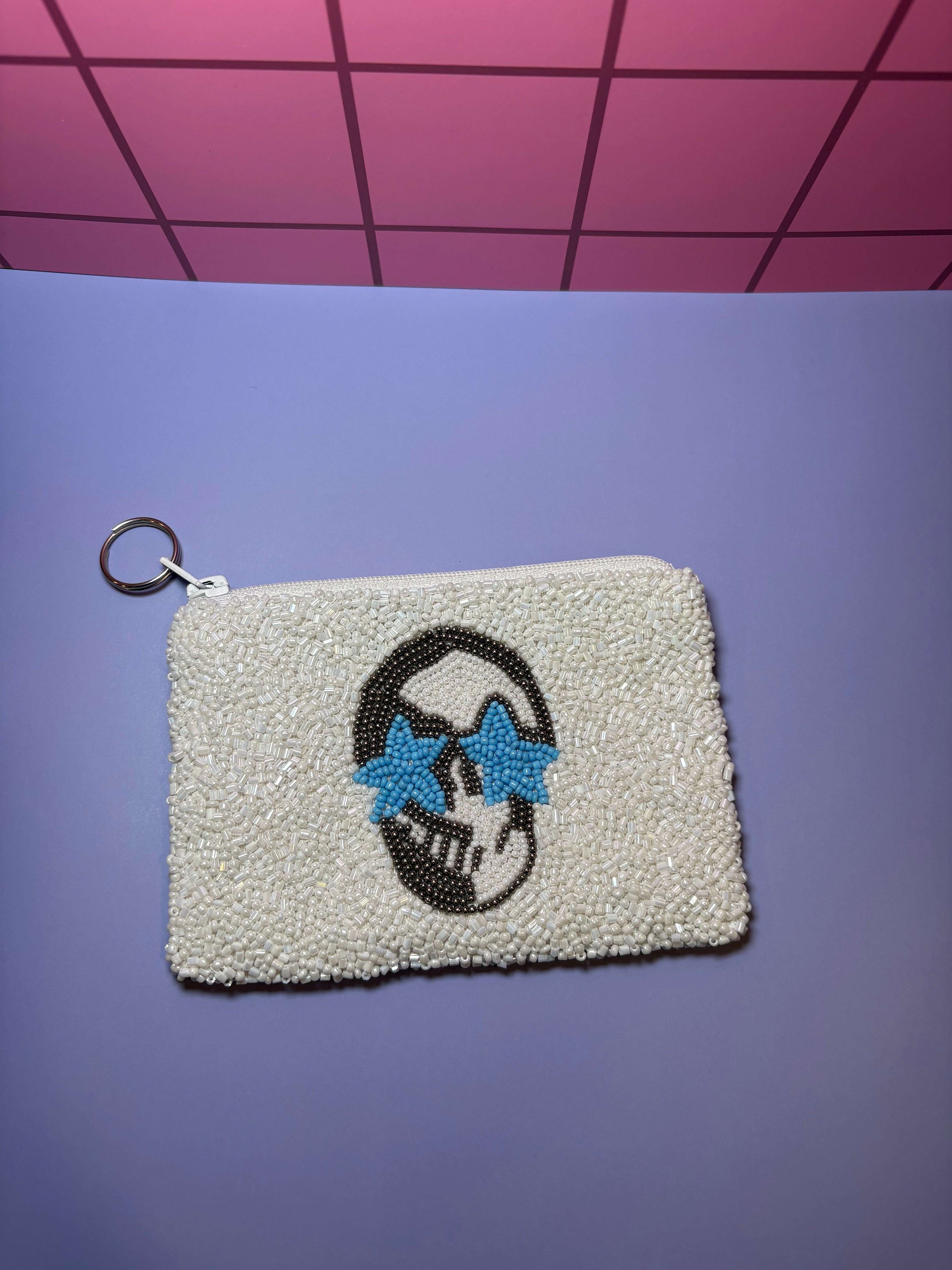 White Skull with Blue Star Eyes Beaded Pouch