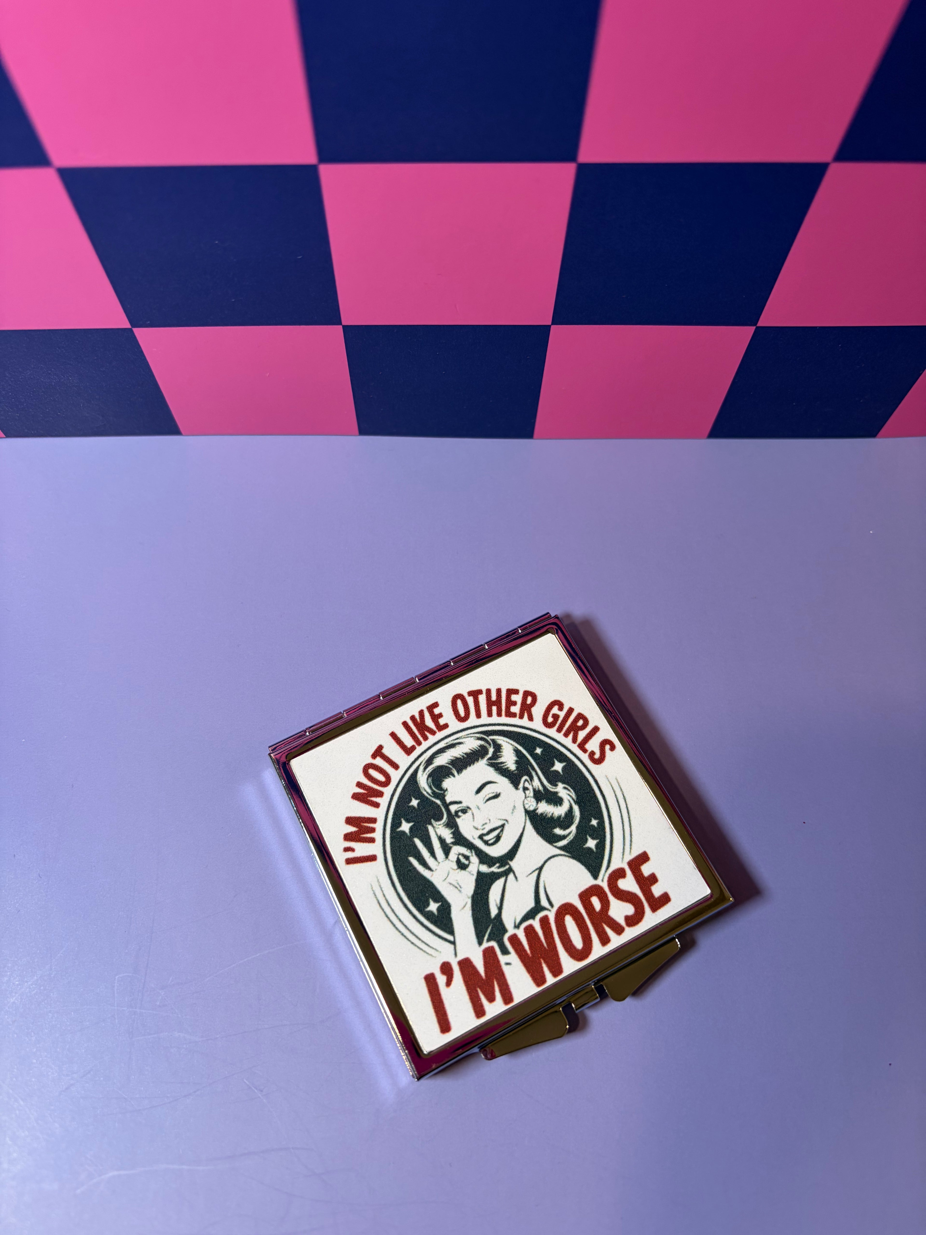 Compact mirror with "I'm Not Like Other Girls I'm Worse" graphic