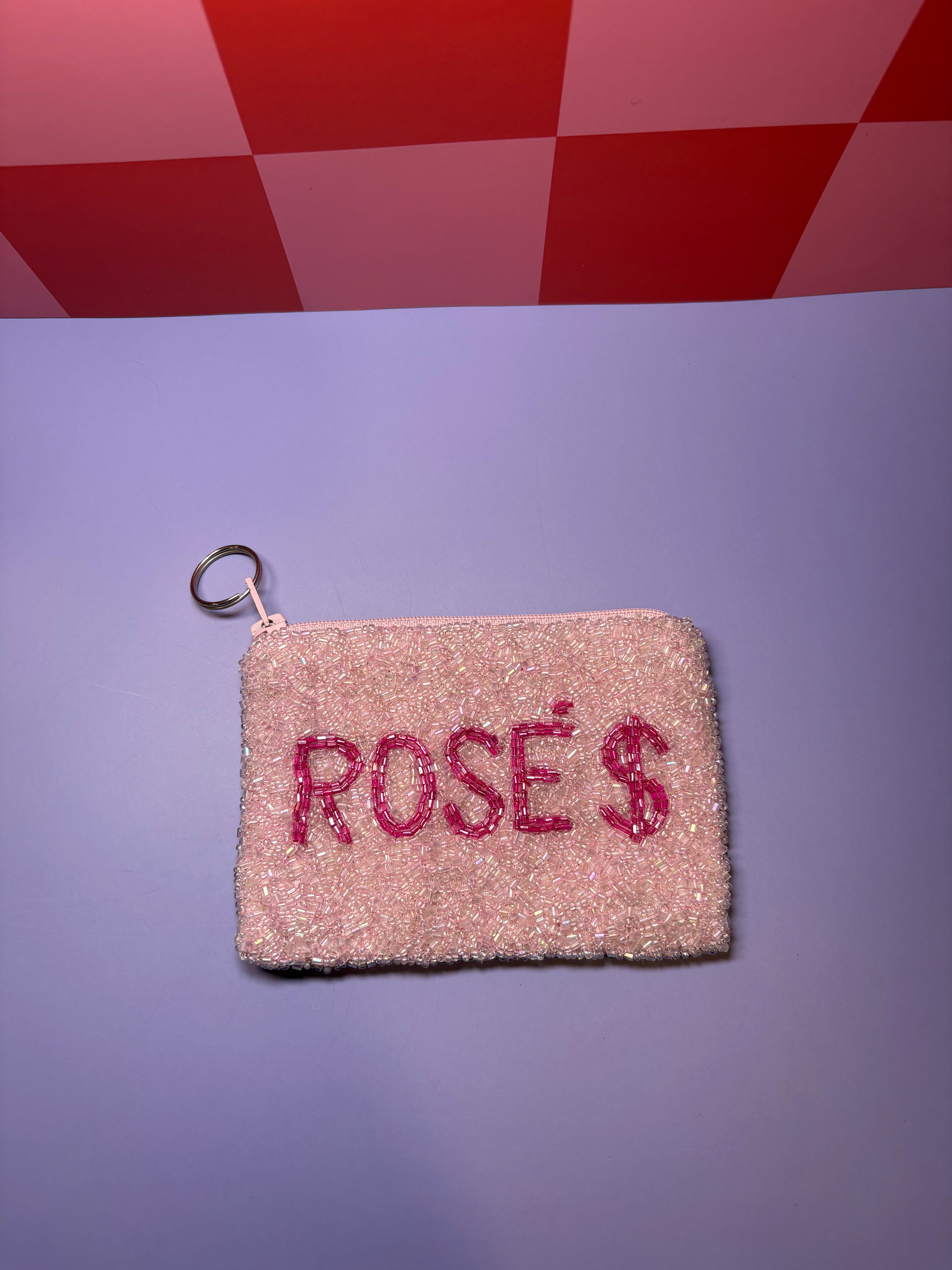 Pink pouch with 'ROSE $' hot pink text
