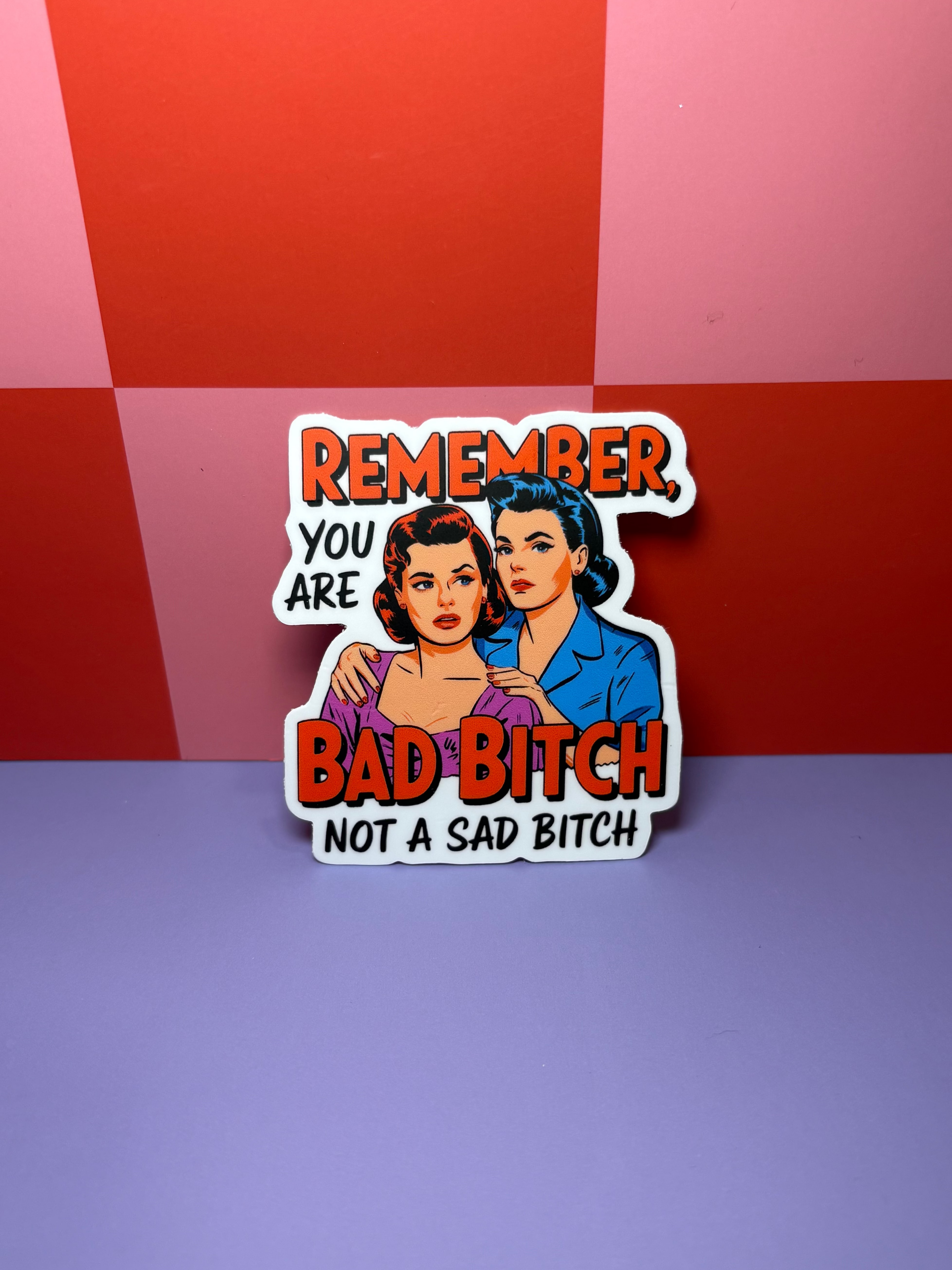 Sticker with two women and red and black "Remember You Are a Bad Bitch Not a Sad Bitch" text 