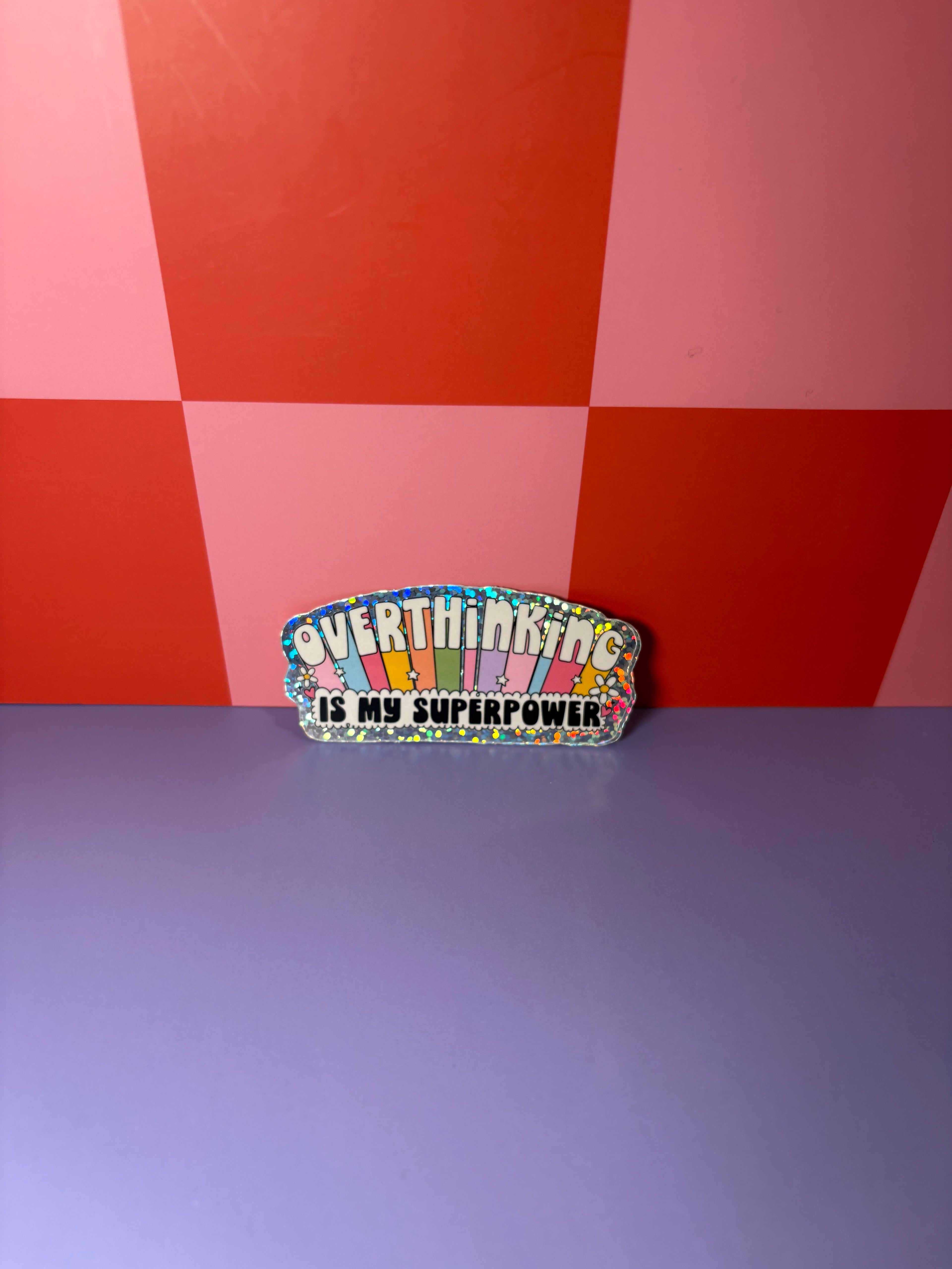 Rainbow sticker with "overthinking is my superpower" text