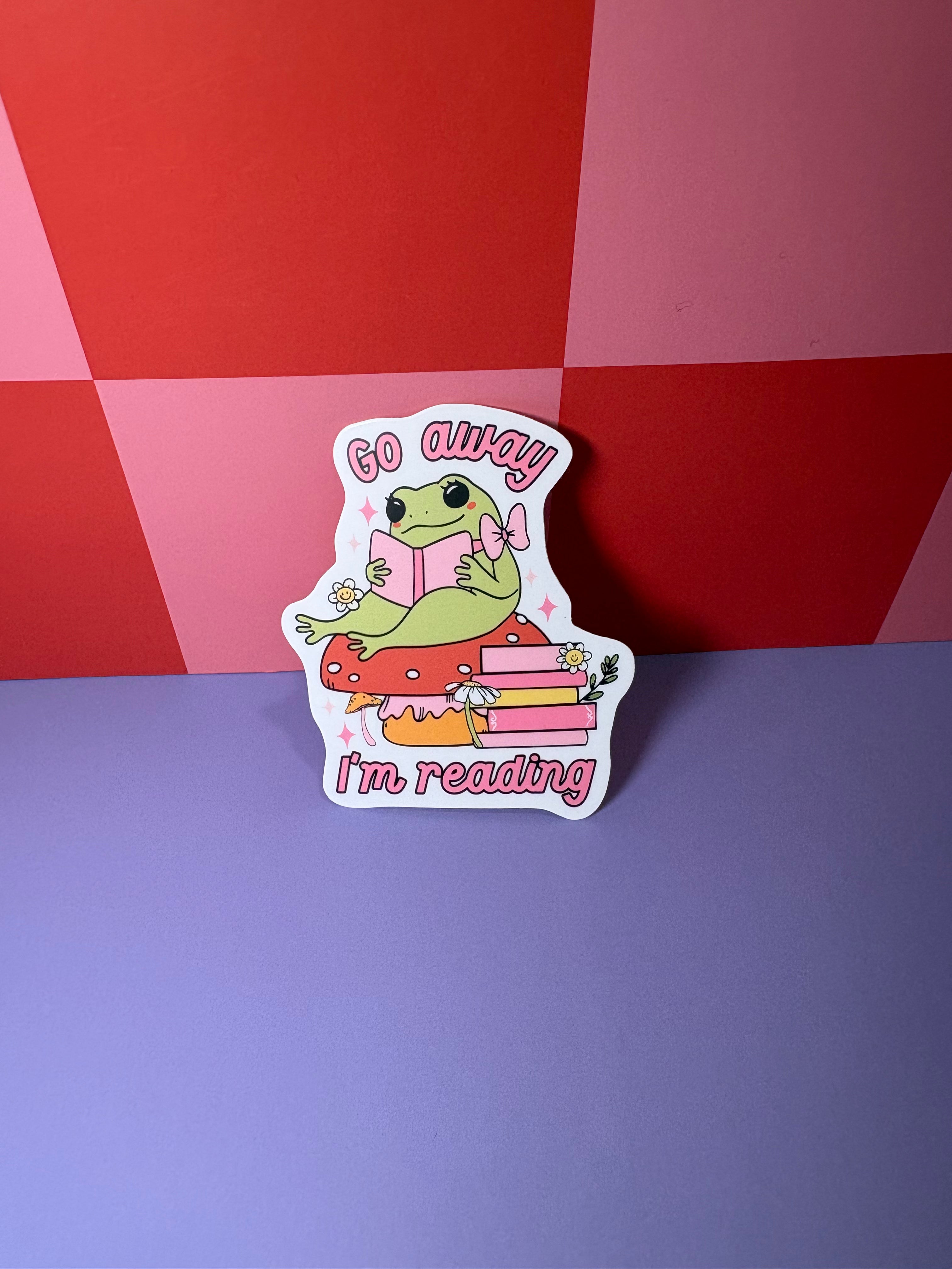 "Go away I'm reading" frog sticker