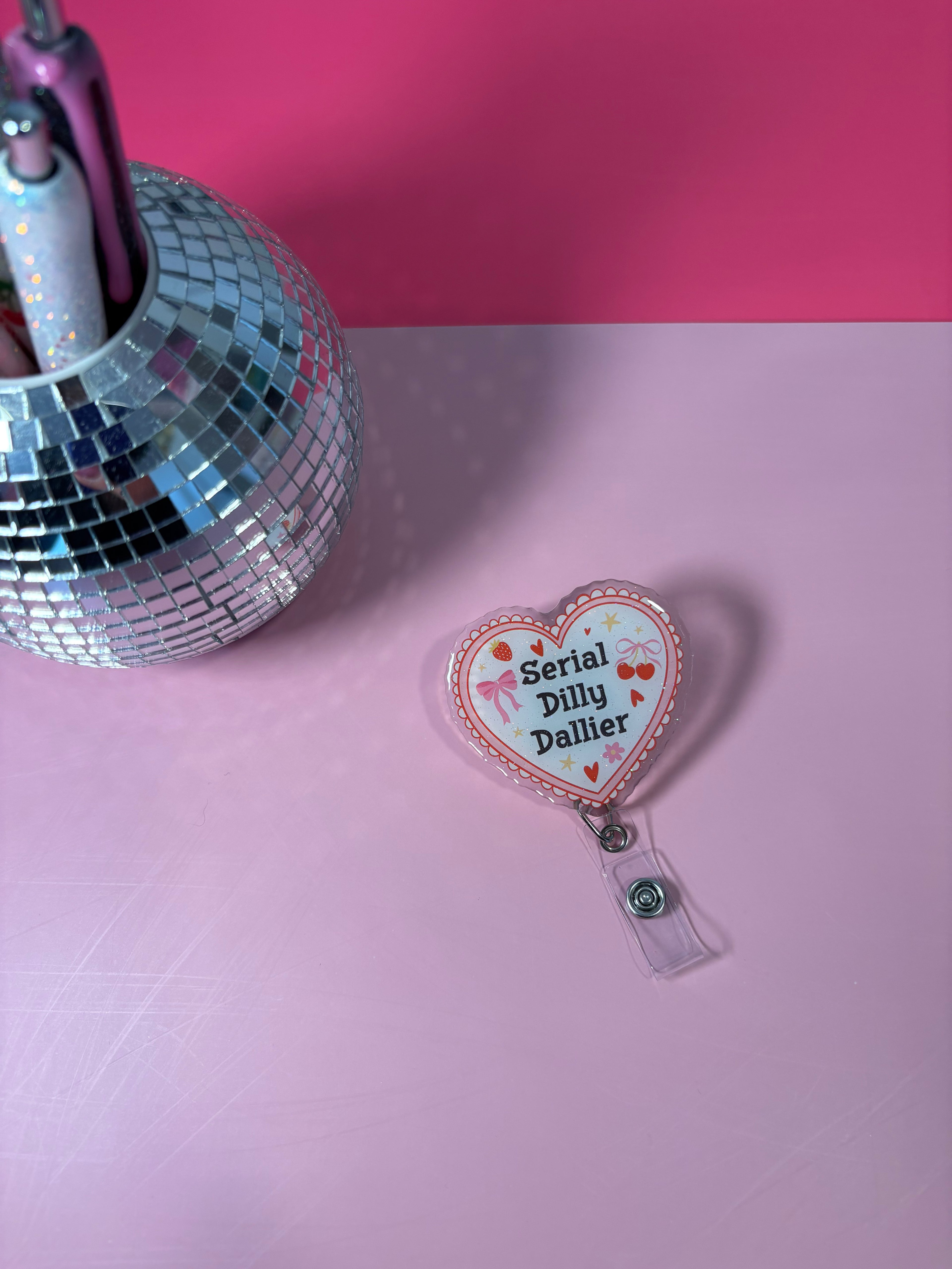 Serial Dilly Dallier- Badge Reel