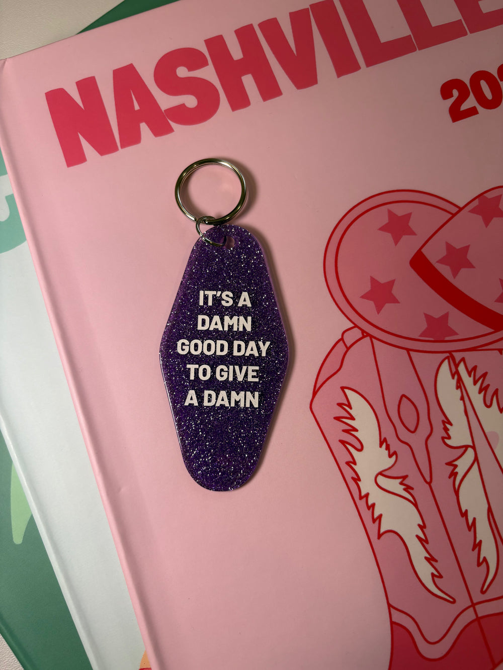 Its a damn good day to give a damn  - Motel Keychain