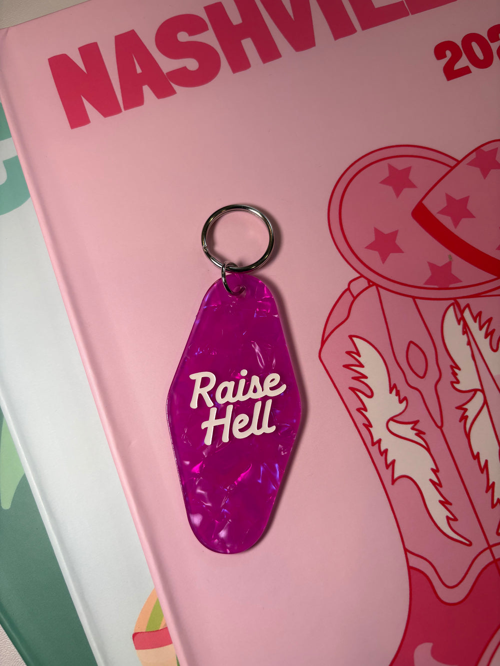 Raise hell  - Motel Keychain