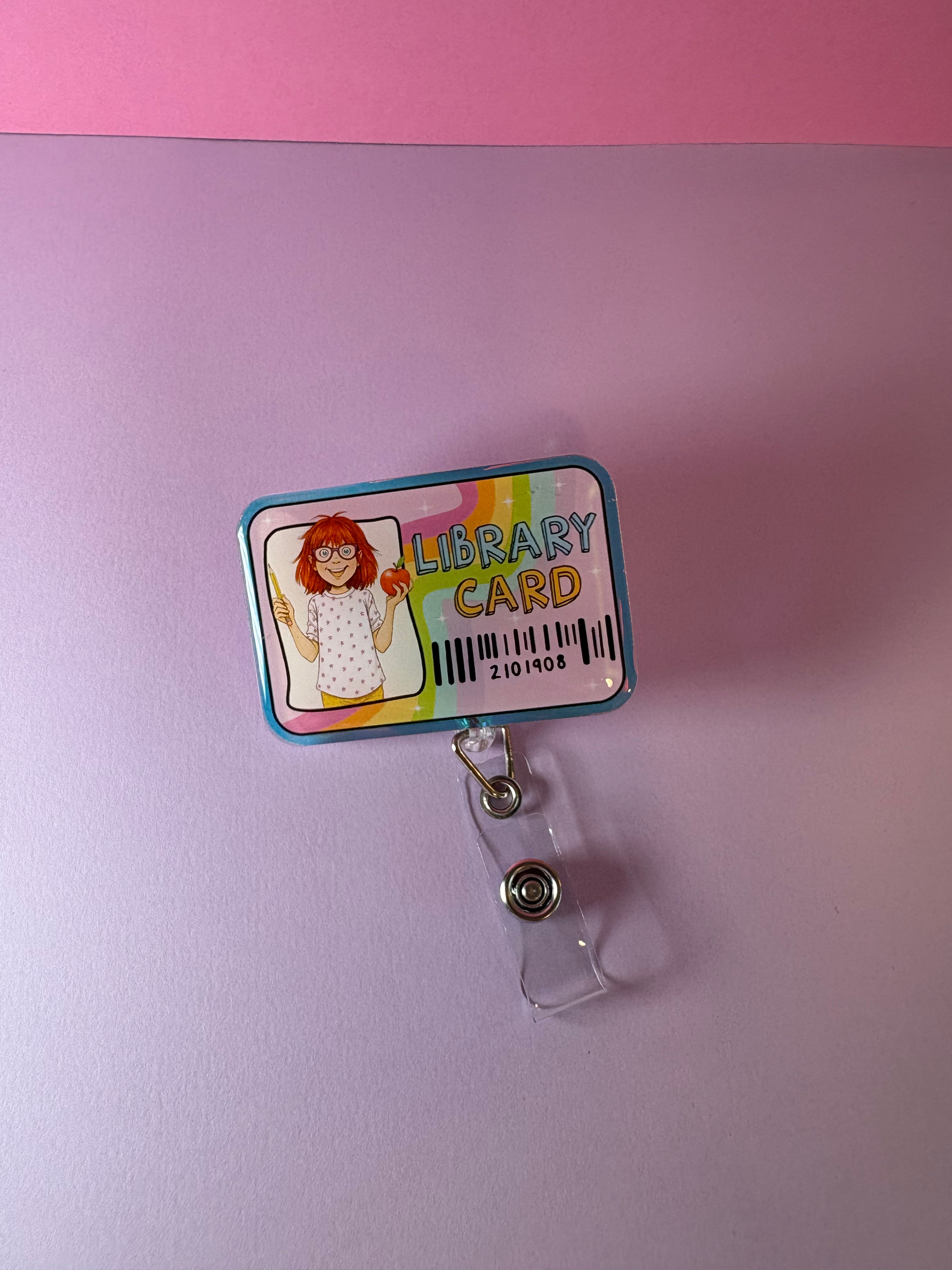 Colorful library card badge reel with cartoon character Junie B. Jones
