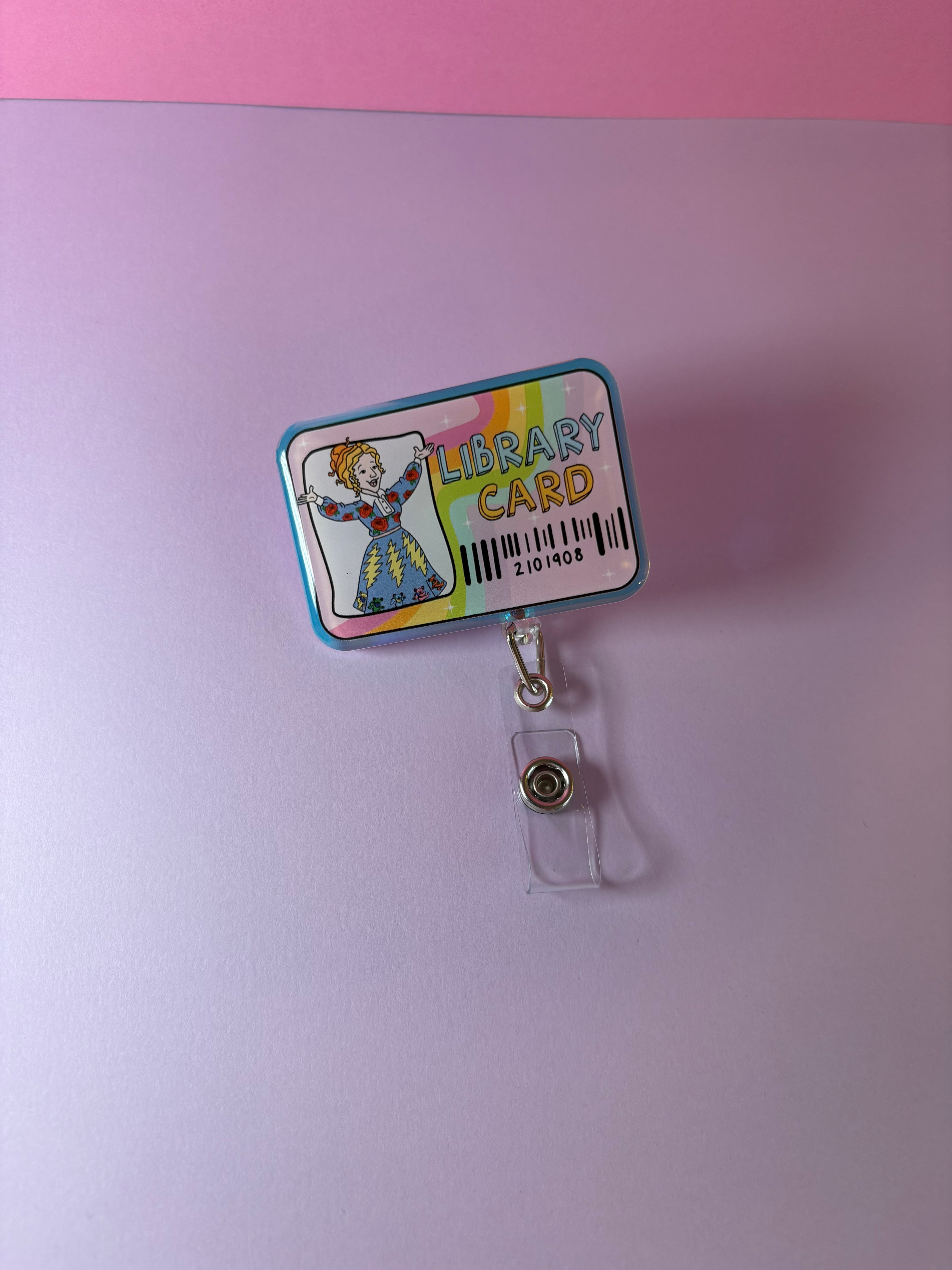 Magic school bus character Ms. Frizzle badge reel library card design