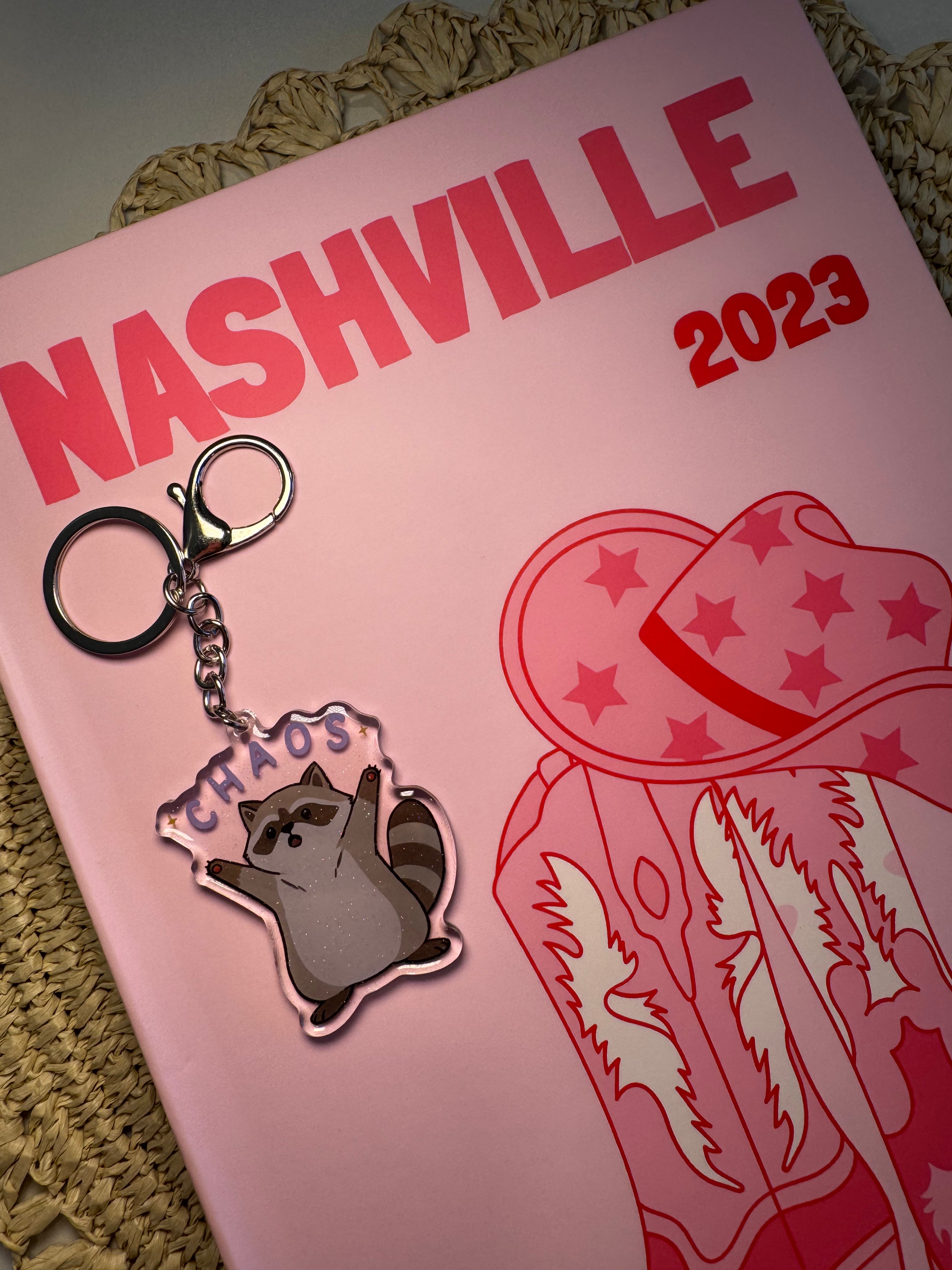 Chaos Raccoon - Keychain – Please note that the keychain does have glitter