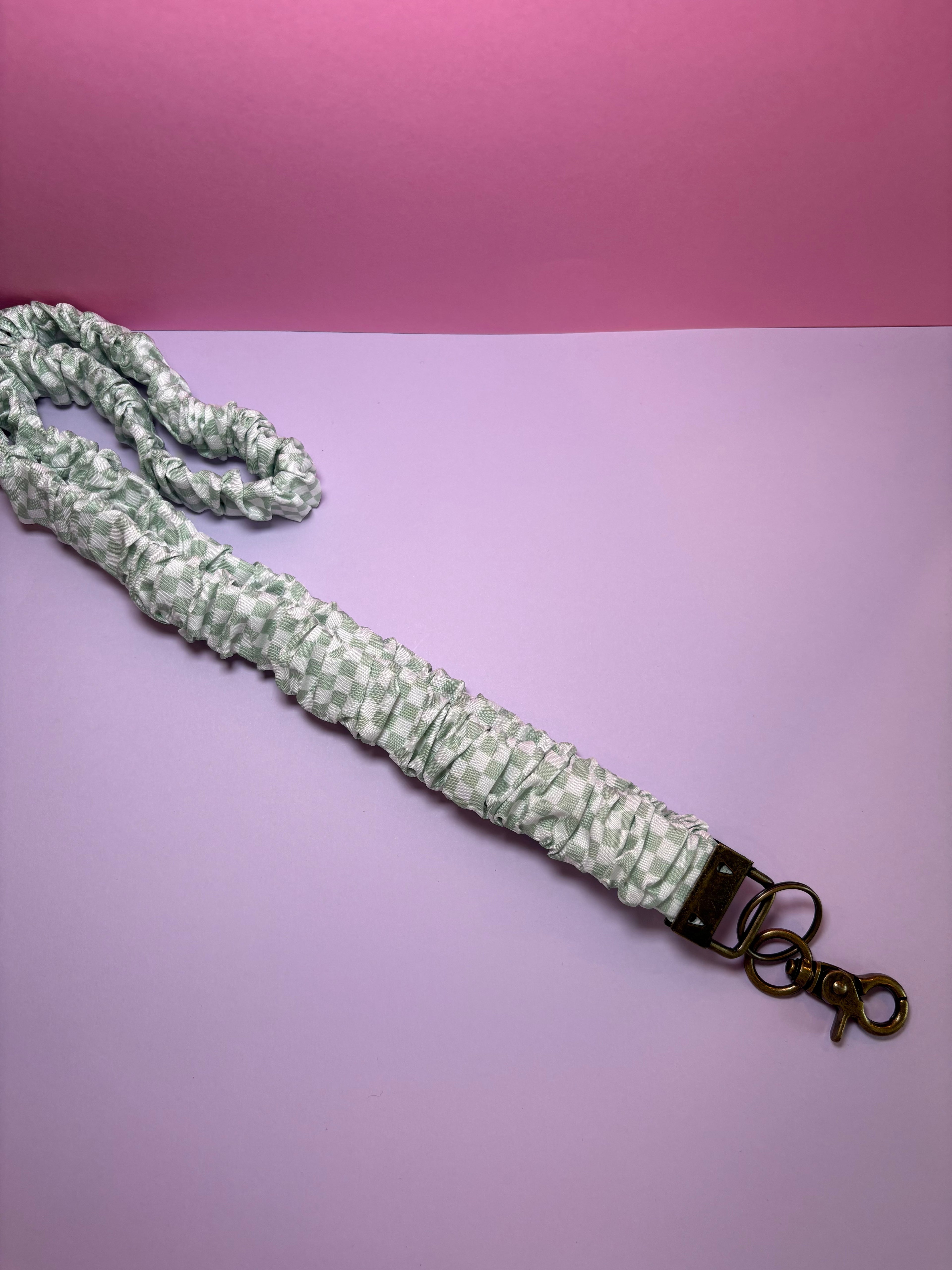 Green and white checker lanyard