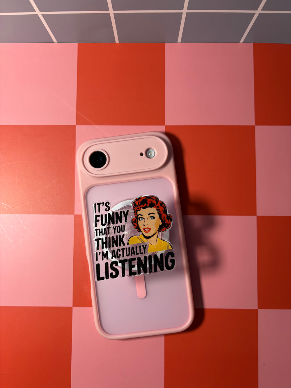"It's funny that you think I'm actually listening" Phone & E-Reader MagSafe Grip