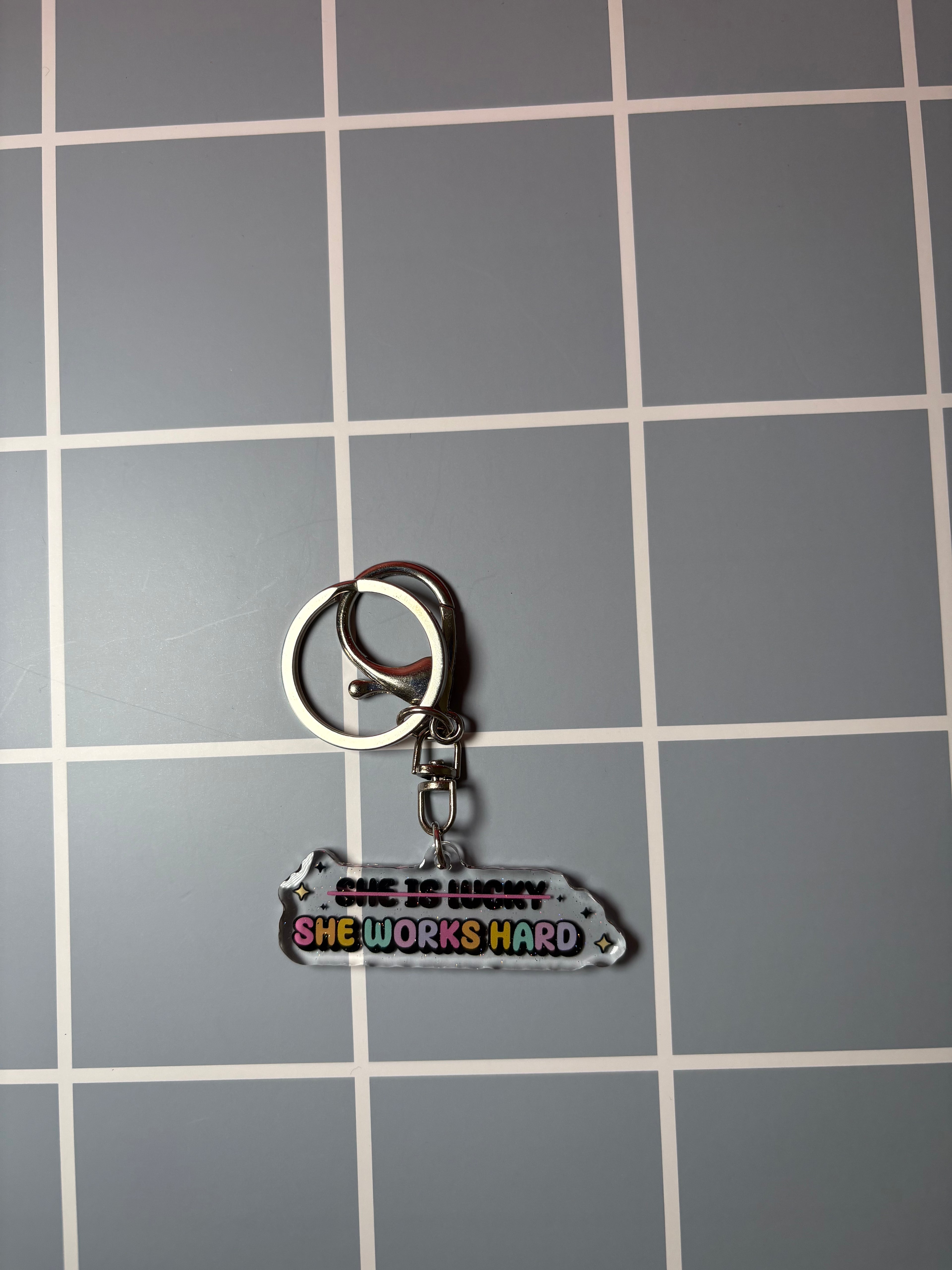 She is lucky, she works hard- Keychain