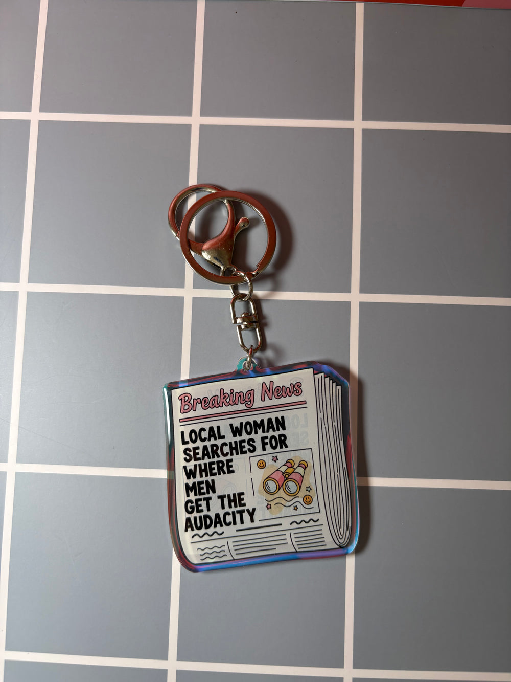 Local woman searches for where men get the audacity - Keychain
