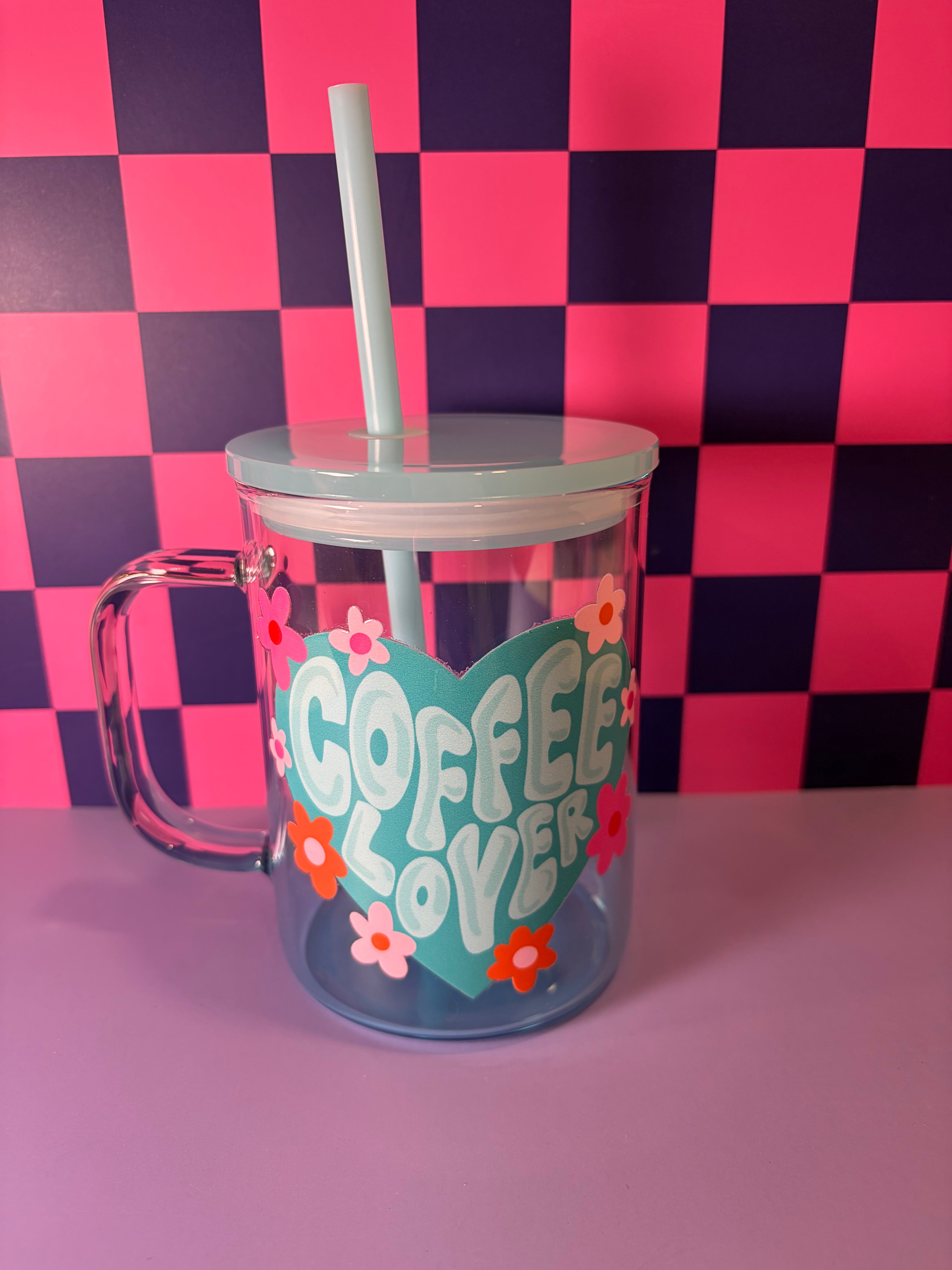 Light teal clear mug with 'Coffee Lover' text and floral design 