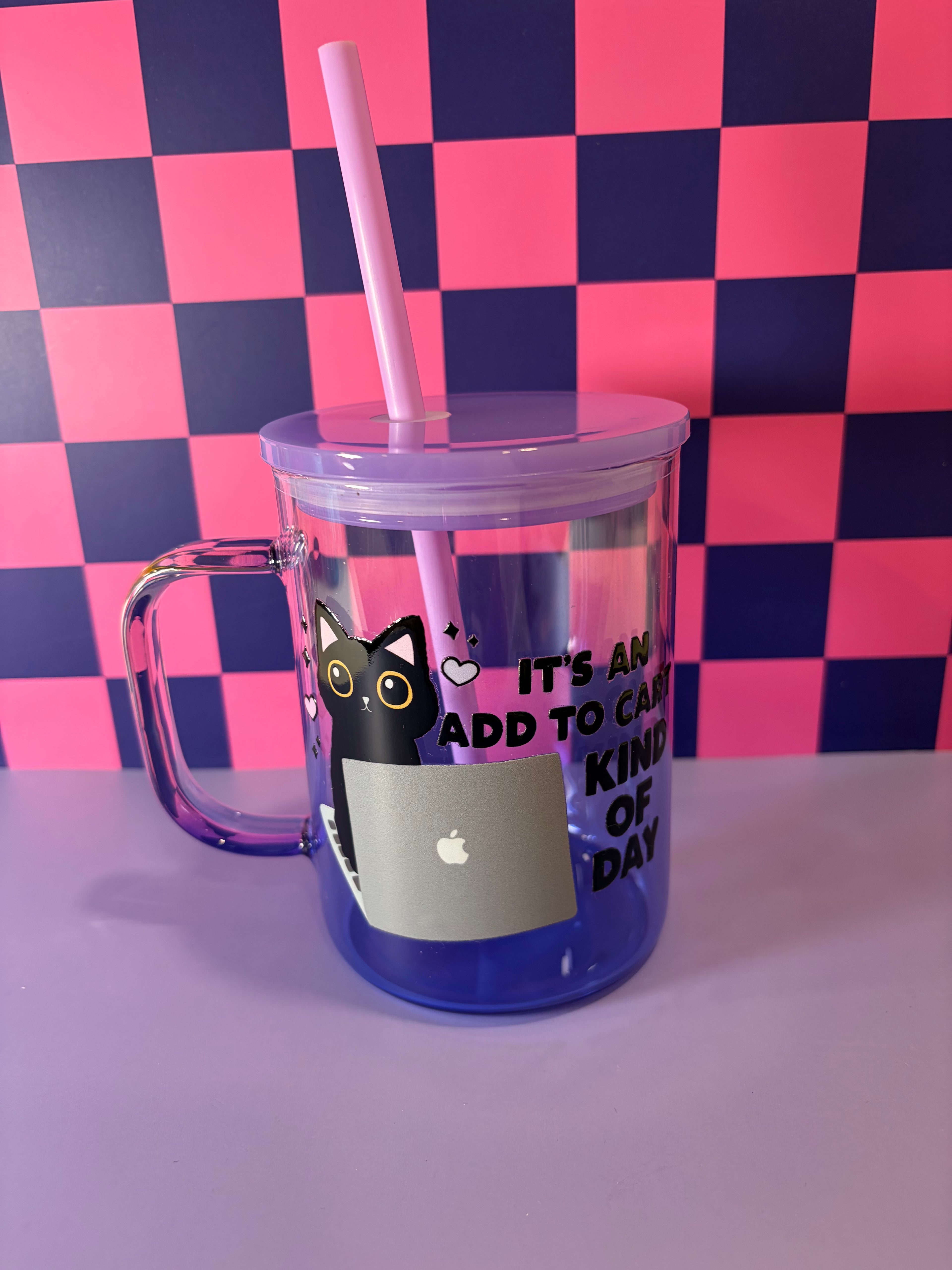 Clear tumbler with purple lid and straw, featuring a cat on a computer design and text "It's An Add to Cart Kind of Day"
