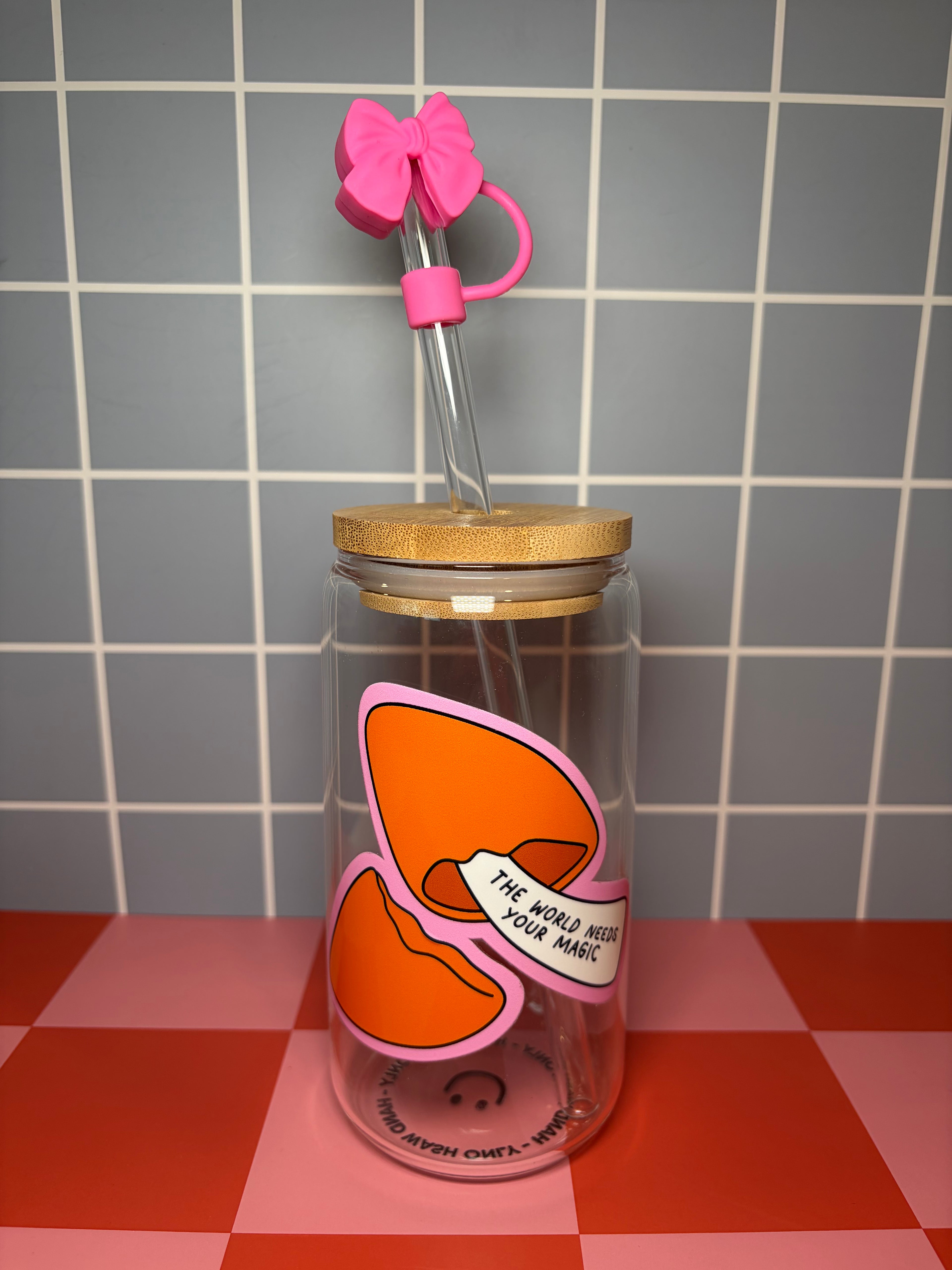 Mushroom graphic glass can with pink bow straw topper