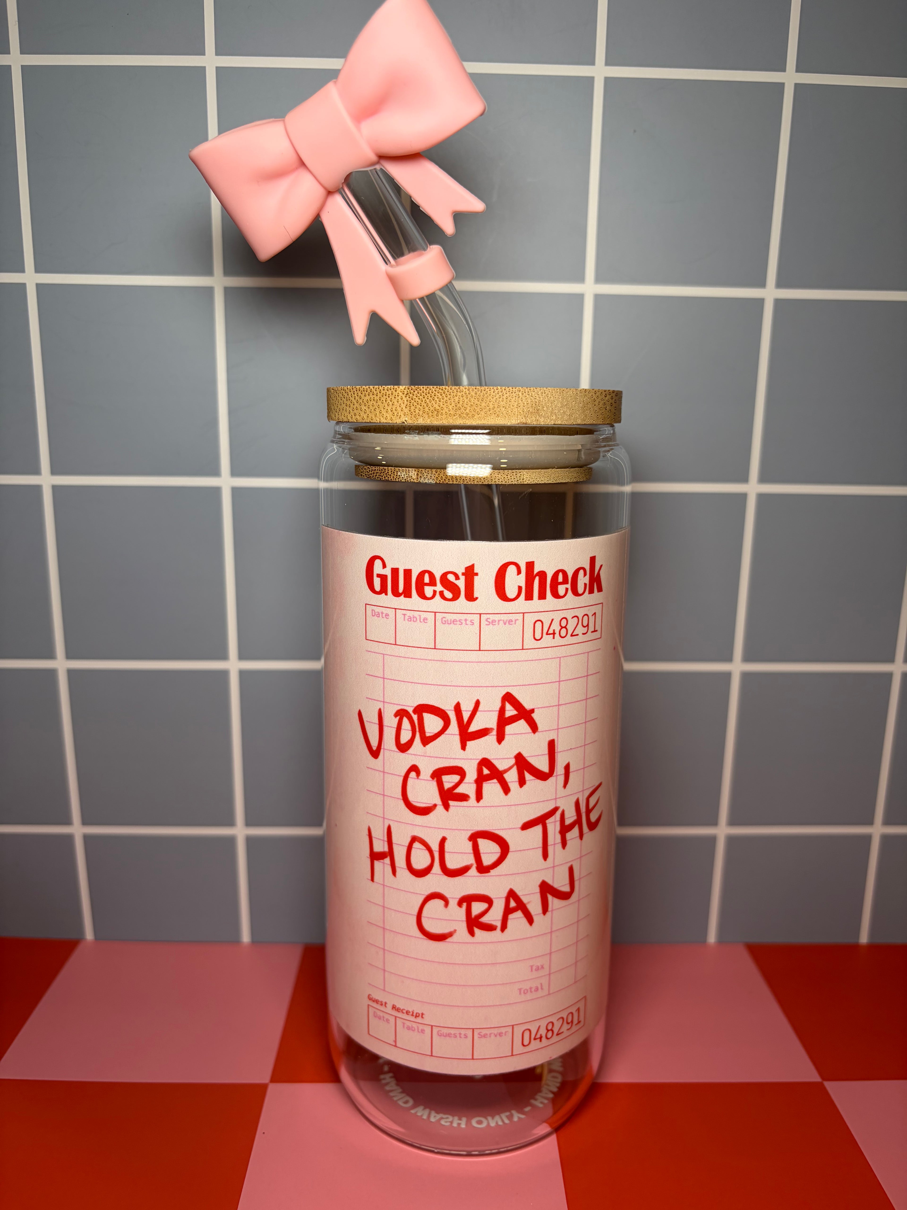 Guest check vodka cran-themed glass can with straw topper