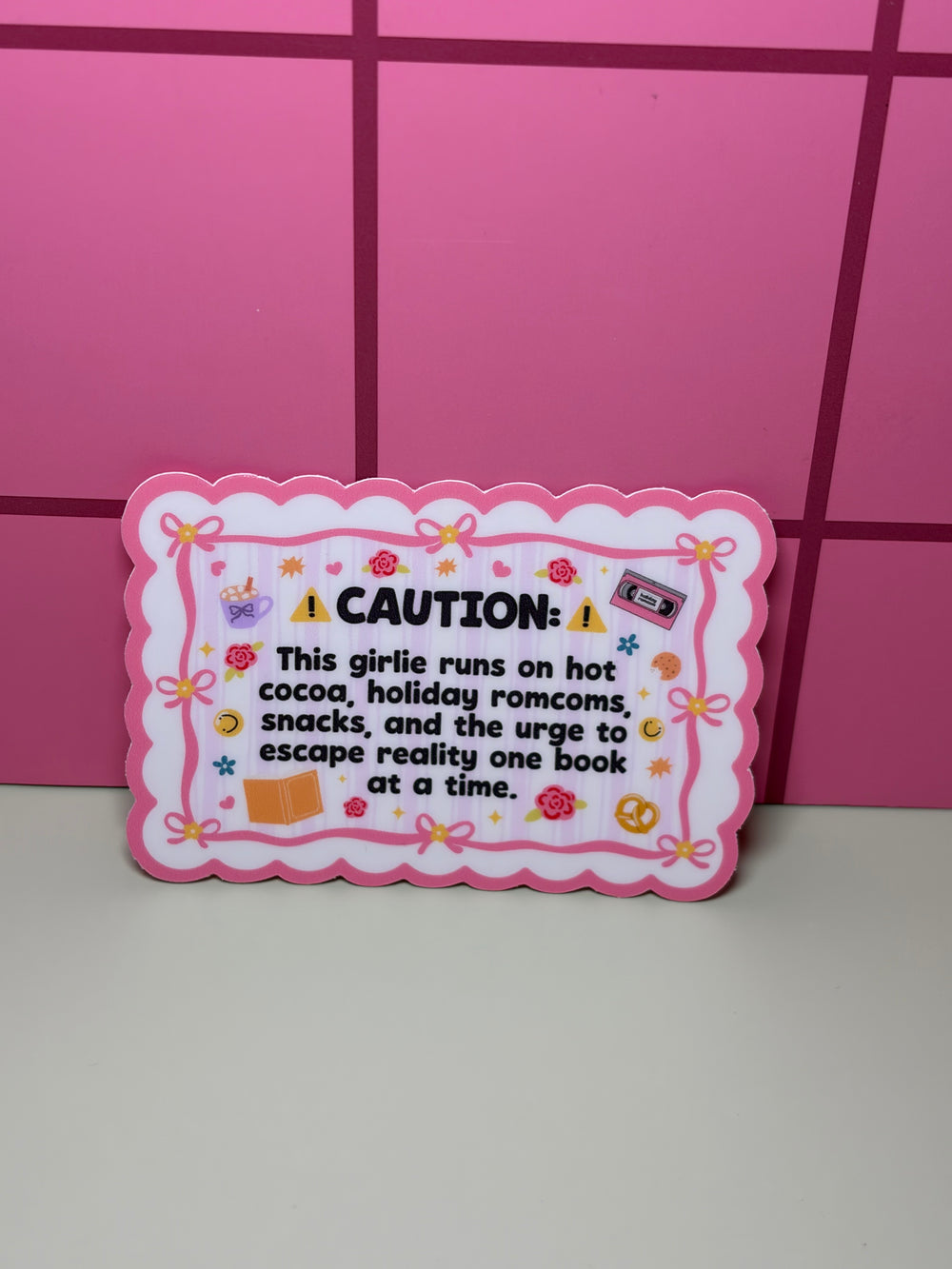 Caution: This girlie runs on hot coca, holiday rom coms, snacks, and the urge to escape reality one book at a time- Sticker